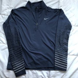NIKE half zip sweatshirt with stripes on sleeve